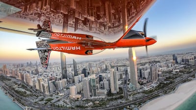 Red Bull Air Race pilot Martin Sonka of the Czech Republic during a practice session with the Abu Dhabi cityscape in the background. All photos Predrag Vuckovic via Getty Images