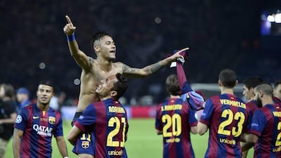 Barcelona’s Neymar celebrates after his team won 3-1 in the Uefa Champions League final against Juventus at the Olympic Stadium in Berlin on Saturday, June 6, 2015. (AP Photo/Martin Meissner)