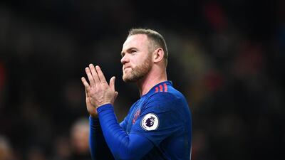 Wayne Rooney of Manchester United shows appreciation to Manchester United fans after the Premier League match between Stoke City and Manchester United at Bet365 Stadium on January 21, 2017 in Stoke on Trent, England. Wayne Rooney scored his 250th goal for Manchester United in all competitions, which makes him the club's top goal scorer of all time. Laurence Griffiths / Getty Images