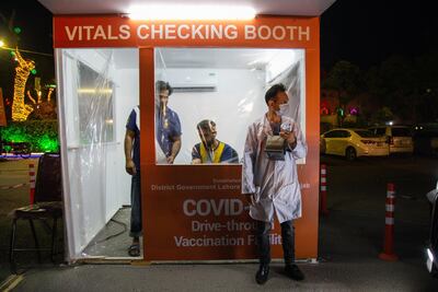 A vitals checking booth at a drive-through vaccination centre in Lahore, Pakistan. Bloomberg