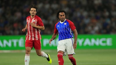 Christian Karembeu of the France 98 team in action with FIFA 98’s Fernando Morientes. Gonzalo Fuentes / Reuters