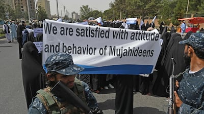 Some women fear that a form of gender apartheid will be imposed on the country under the new regime, although those attending the march, flanked by armed Taliban fighters, disagree. AFP