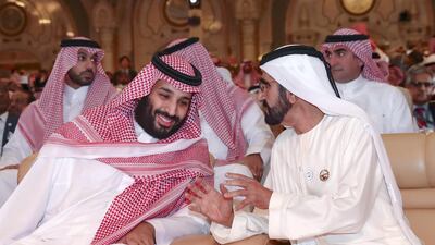 Sheikh Mohammed bin Rashid, Vice President and Ruler of Dubai, speaks to Saudi Arabia Crown Prince Prince Mohammed bin Salman on second day of Future Investment Initiative in Riyadh on Wednesday. Dubai Media Office / Wam
