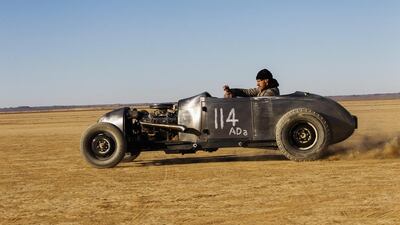A 1929 Model A4 is driven across the desert during the 2013 Kalahari Desert Speedweek at Hakskeenpan, Northern Cape, South Africa. Nic Bothma / EPA