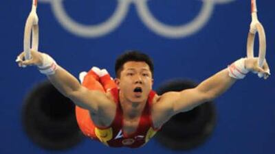 China's Yibing Chen competes in the men's rings final of the artistic gymnastics event of the Beijing 2008 Olympic Games in Beijing on August 18, 2008.
