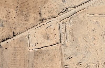 A satellite image shows what a US advocacy group says is a mass grave in Al Qutayfah, Syria. Reuters