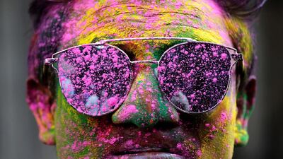 A man smeared in colours in Kolkata. Rupak De Chowdhuri / Reuters