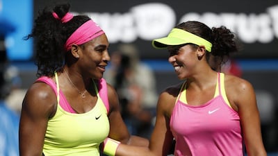 Serena Williams, left, and Madison Keys greet each other at the net after their Australian Open semi-final match. Made Nagi / EPA