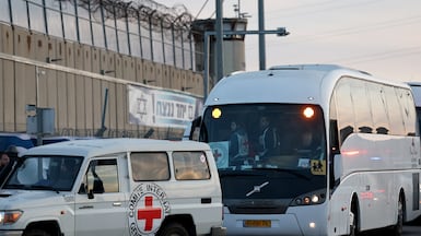 Red Cross vehicles enter Ofer military prison, north of Jerusalem, in January last year. EPA