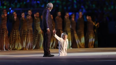 Qatari motivational speaker and social media influencer Ghanim Al Muftah shares the stage with Hollywood star Morgan Freeman at the opening ceremony of the Qatar 2022 World Cup. AFP