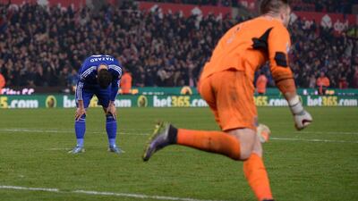 Chelsea’s Eden Hazard reacts after being stopped by Jack Butland to send his side out of the League Cup against Stoke City on Tuesday. Oli Scarff / AFP