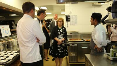 Barbara Leaf, US ambassador to the UAE, visits the kitchen before the Discover America dinner at Ray's Grill.