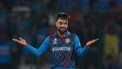 Afghanistan's Rashid Khan celebrates the wicket of India's Ishan Kishan. AP