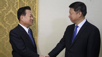 North Korean ruling party official Choe Ryong Hae, left, greets Song Tao, the highest-level Chinese envoy to visit the country in two years, at the Mansudae Assembly Hall in Pyongyang on November 17, 2017. Kim Kwang Hyon / AP Photo