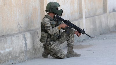 A Turkish solider keeps guard in Tal Abyad. Reuters