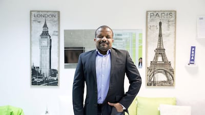 Chris Folayan was brought up in Nigeria and says "when you are raised around poverty you never want to be poor". Pawan Singh / The National