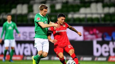 Johannes Eggestein (L) of Bremen in action against Charles Aranguiz (R) of Leverkusen during the German Bundesliga soccer match between SV Werder Bremen and Bayer 04 Leverkusen in Bremen, Germany. EPA