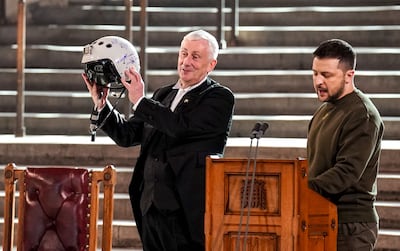Volodymyr Zelenskyy gave an airman's helmet to House of Commons Speaker Lindsay Hoyle to make a point about fighter jets. Getty