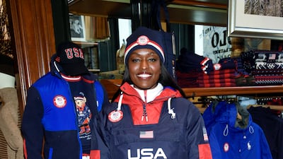 Bobsledder Aja Evans models the Team USA Beijing Winter Olympics opening ceremony uniforms. AP