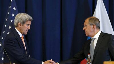 John Kerry and Sergei Lavrov shake hands at the conclusion of their press conference following their meeting in Geneva where they discussed the crisis in Syria on September 9, 2016. The United State and Russia agreed a plan to impose a ceasefire in the Syrian civil war and lay the foundation of a peace process, US Secretary of State John Kerry said. Kevin Lamarque / AFP