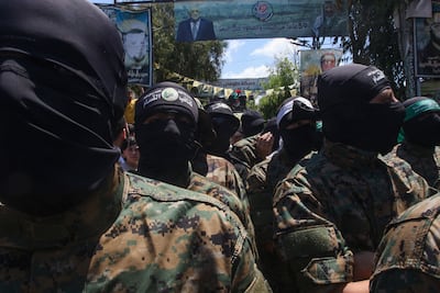 Gunmen at the funeral of a Hamas commander killed in an Israeli strike in the southern Lebanese city of Sidon, at the nearby Ain Al Helweh Palestinian refugee camp, in 2024. AFP