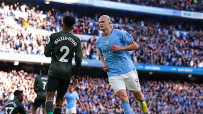 Erling Haaland celebrates scoring the fourth goal at Etihad Stadium. PA