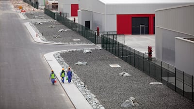 Warehouses at the Almarkaz industrial development near Abu Dhabi, the first project of Waha Land, a Waha Capital subsidiary. Silvia Razgova / The National