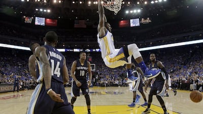 Golden State Warriors’ Festus Ezeli (31) dunks against the Memphis Grizzlies during the first half of an NBA basketball game Wednesday, April 13, 2016, in Oakland, California. (AP Photo/Marcio Jose Sanchez)