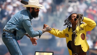 Singers Post Malone and Swae Lee perform during the closing ceremony. Reuters