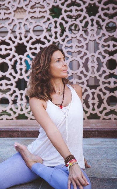 As new owner of the Hot House yoga studio, Pem Fassa, centre, has rejuvenated the space and its energy. Courtesy Pem Fassa