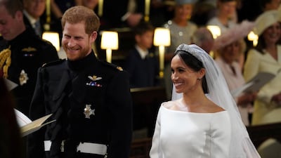 Prince Harry and Meghan Markle in St George's Chapel at Windsor Castle during their wedding in Windsor. Jonathan Brady / Reuters