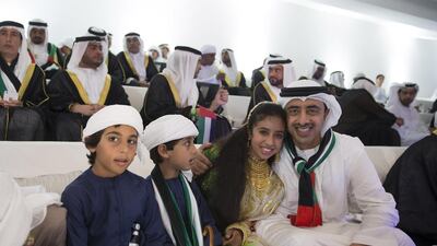Sheikh Abdullah bin Zayed, Minister of Foreign Affairs (R) poses for a photo with Sheikha Fatima bint Abdullah (2nd R) at the 44th UAE National Day celebrations at Zayed Sports City. Mohamed Al Hammadi / Crown Prince Court - Abu Dhabi