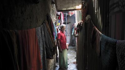 Anjapuli Rangan and his 12 family members live in a slum at Sta Cruz. He has been waiting since 1997 for completion of the SRA apartment building where he would have moved. Subhash Sharma for The National