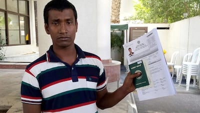 Mohammed Sumon Miah, a Bangladeshi cleaner, works at the Saudi border and was not aware of the deadline to convert the old style passports. Anwar Ahmad / The National