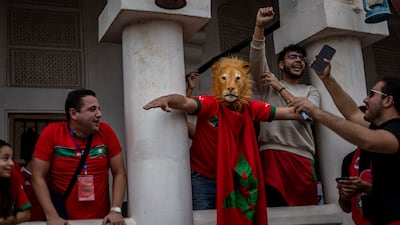 Fans of Morocco cheer at the Souq Waqif market in Doha, Qatar, before their World Cup quarter-final match against Portugal. EPA