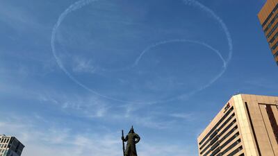 A view of the taegeuk symbol left in the sky by the tracks of South Korea's Air Force. EPA