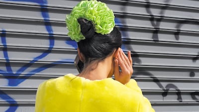 A graffiti-covered backdrop is typical of New York. Courtesy Farah Al Qasimi