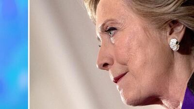 Democratic US presidential candidate Hillary Clinton has blamed FBI director James Comey (not shown) for her loss in the US presidential race, claiming that re-opening the investigation into her email use broke the momentum towards victory. Jim Watson / AFP