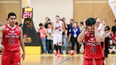 Manny Pacquiao gets frustrated after fumbling the ball eat the Al Wasl Sports Club. Victor Besa for The National