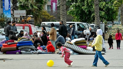 Displaced residents who fled Israeli air strikes in Beirut's southern suburbs along the corniche in the Lebanese capital. EPA
