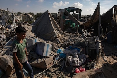 The results of Israeli shelling at a camp housing internally displaced people in Khan Younis, southern Gaza. EPA