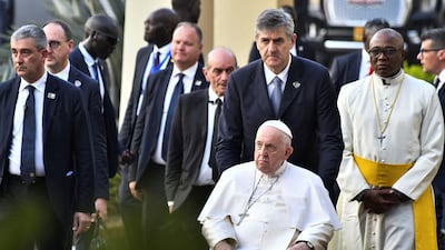 Pope Francis attends a meeting with authorities, leaders of civil society and the diplomatic corps, in the garden of the Presidential Palace. Reuters