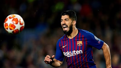 Suarez goes for the ball. EPA