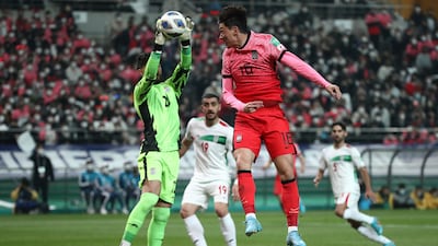 Hwang Ui-Jo of South Korea challenges Iran goalkeeper Amir Abed Zadeh. Getty