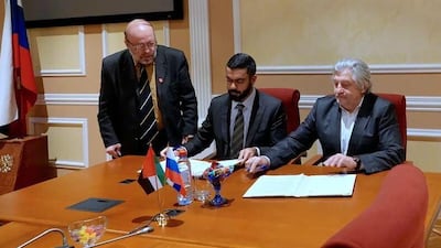 Saif Saeed Ghobash, Undersecretary of DCT – Abu Dhabi (centre) with Vladimir V Grigoriev, deputy head of the Federal Agency for Press and Mass Communications (right)