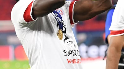 Alphonso Davies of Bayern Munich lifts the Uefa Super Cup trophy. EPA
