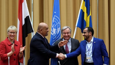Yemeni Foreign Minister Khaled Al Yaman and head of the Houthi delegation Mohammed Abdul-Salam shake hands in Sweden. Reuters