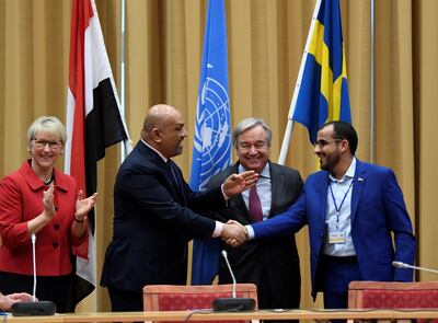 Yemeni Foreign Minister Khaled Al Yaman and head of the Houthi delegation Mohammed Abdul-Salam shake hands in Sweden. Reuters