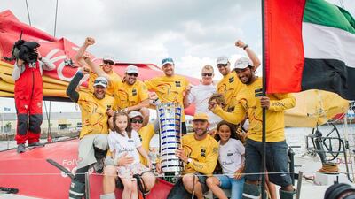 Abu Dhabi Ocean Racing team celebrates with the Volvo OCean Race trophy. Jonathan Nackstrand / AFP