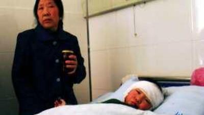 A child who was injured during a knife attack receives medical treatment at a hospital in Taixing, Jiangsu province.